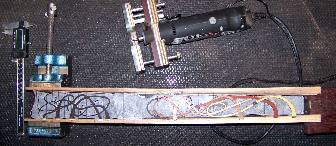 Partially inlayed fingerboard and Dremel