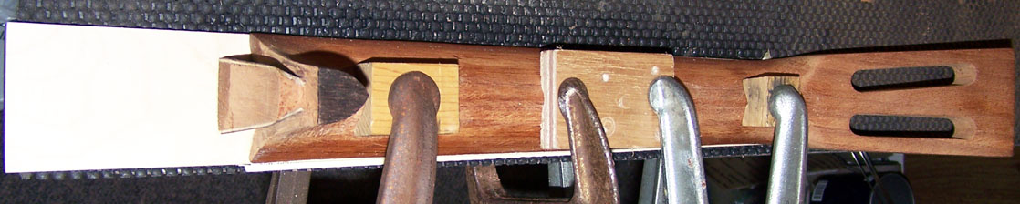 Fingerboard gluing to the neck