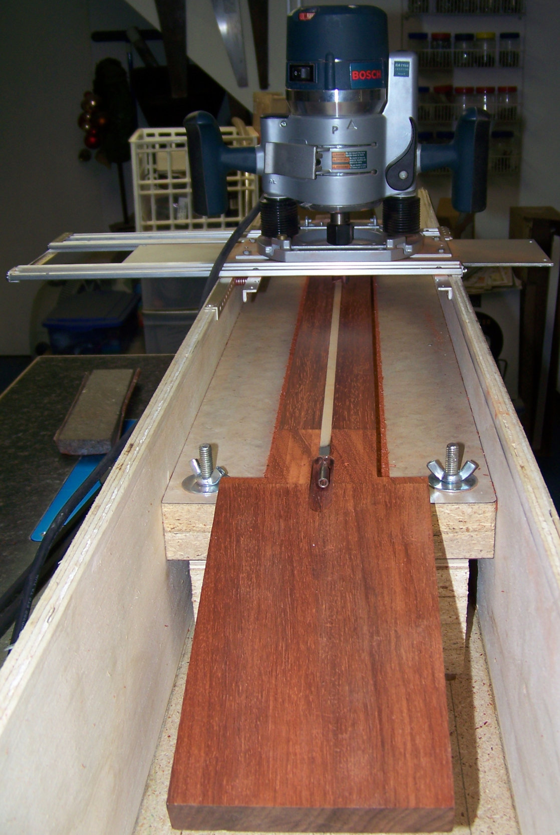 Neck in planing jig.